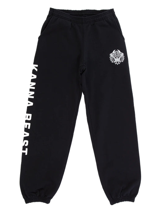 Flat lay image of Kanna Beast Sweatpants showing our beast face logo on left pocket and Kanna Beast written in white on right leg. 